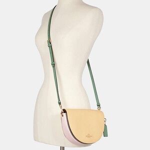 Coach Tan and Pink Crossbody Bag with Green Strap
